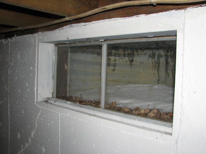 How do you replace a basement window in a concrete foundation