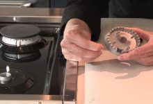 How do you clean gas stove burner ports