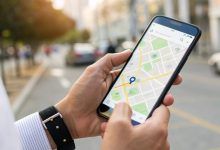Illustration of a business appearing at the top of local search results on a smartphone map, representing the benefits of local SEO in competitive markets