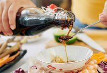 A variety of dark soy sauce substitutes in bowls, ready to enhance home-cooked dishes