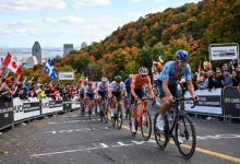 Elite cyclists climbing the steep Côte Camillien-Houde on Mont Royal during the men's road race at the UCI Road World Championships 2026 in Montréal, Canada