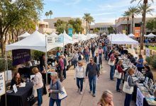 Outdoor book festival at Scottsdale Civic Center with author tents and visitors browsing books on a sunny January day
