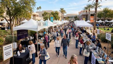 Outdoor book festival at Scottsdale Civic Center with author tents and visitors browsing books on a sunny January day